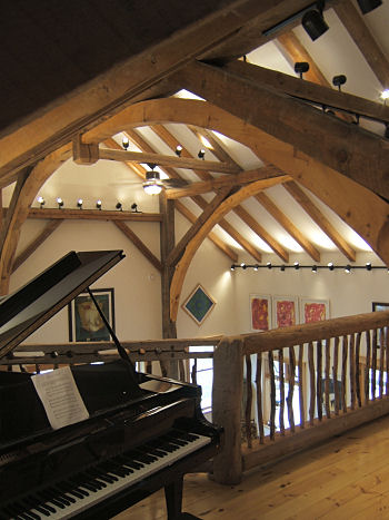 Timber frame mezzanine with live railings and balusters